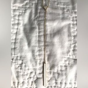 White enamel and gold y necklace